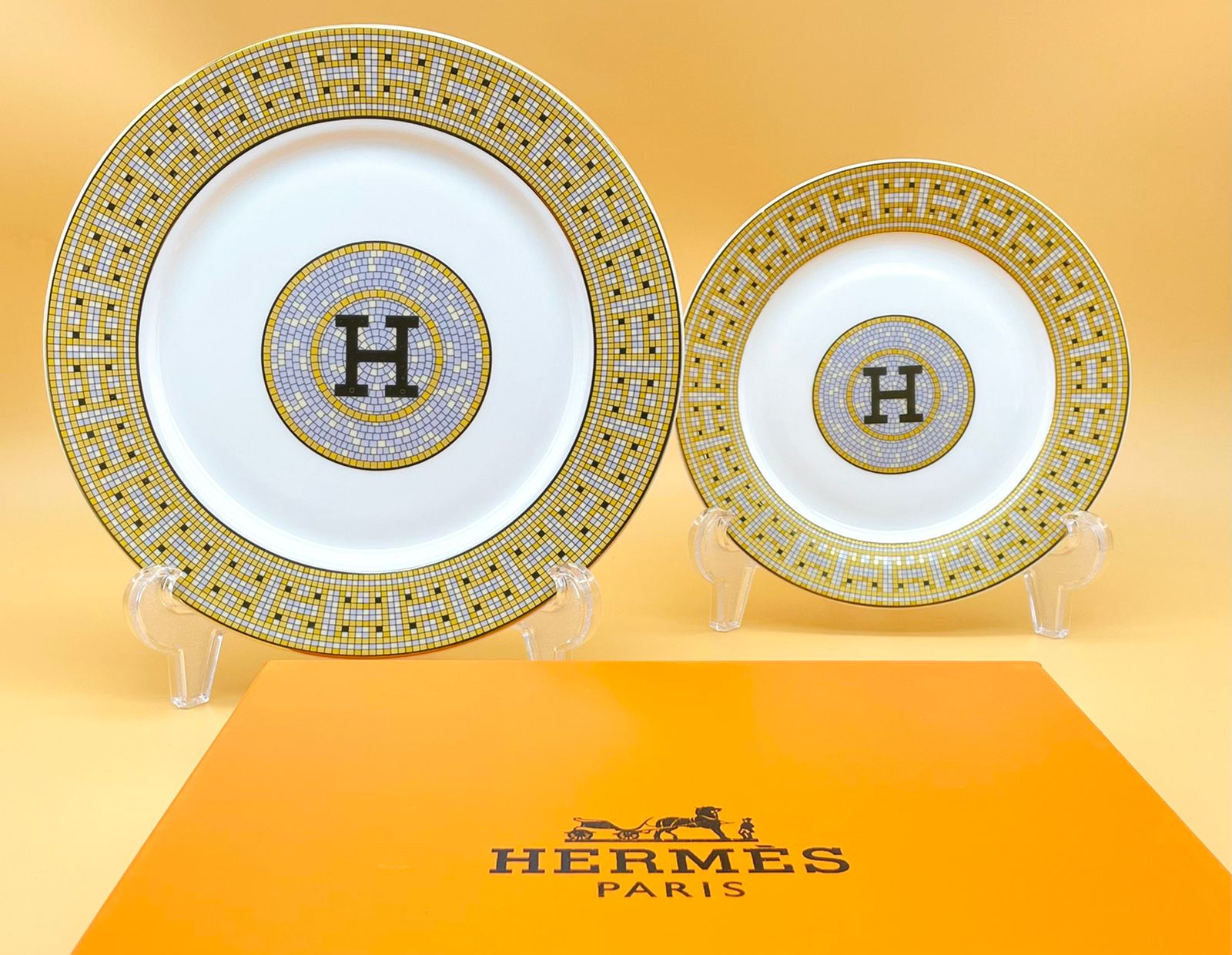 Hermes plates set with black H