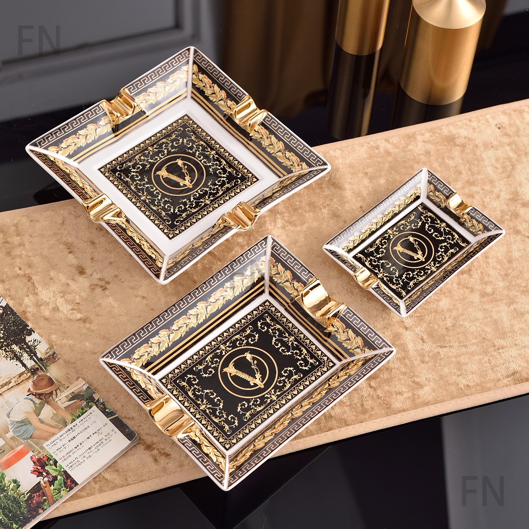 Three ashtrays from Versace